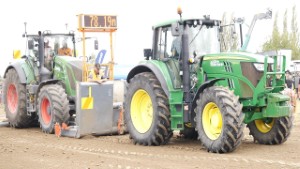 2015 John Deere 6150M Tractor Pulling a Fendt 828 Tractor