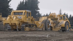 International Harvester TD25 Bulldozer Pushing an IH 295 Payscraper