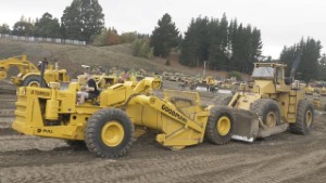 Michigan 280B Wheel Dozer pushing a LeTourneau Model D Tournapull Scraper