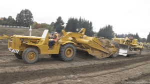 Caterpillar DW15 Scraper getting pushed by a CAT D8H Bulldozer