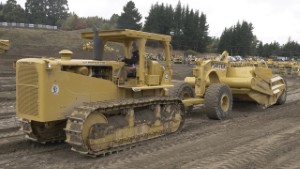 Caterpillar D8H Tractor with a CAT 463G Towed Scraper Working