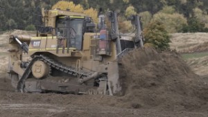 Caterpillar CAT D10T Bulldozer Pushing Dirt