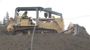 Vintage Caterpillar CAT D6C Bulldozer Pushing Dirt