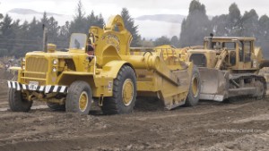 Old Caterpillar D9G Bulldozer pushing a 1968 CAT 630B Scraper