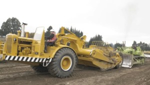 Euclid TC-12 Bulldozer Pushing a 1961 Caterpillar DW21 Scraper