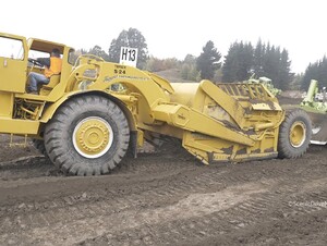 Terex 82-30 Bulldozer Push Loading a Terex S24 Scraper